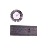 Single flap sanding wheel beside ruler, part of the 20 Pack 80 Grit Flap Wheel Sander Set With Pro Grade One Eighth Inch Shank, 32mm Diameter.