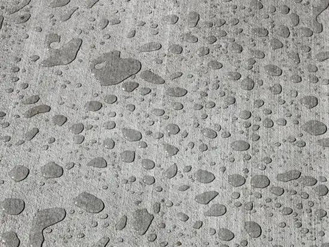 Top Shelf Concrete Water Repellent Sealer 5 Gallon Water Based Silane Siloxane Masonry Protector For Brick And Stone Penetrating Waterproof Coating that shows water beads on concrete surface.