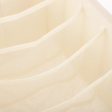 Close-up of Multi Grid Linen Cotton Closet Organizer Drawer Box With Durable Fabric Dividers showing beige mesh compartments.