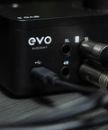 Close-up of EVO 8 USB Audio Interface for Mac and Windows with 4 EVO Mic Pres showing USB and audio ports.