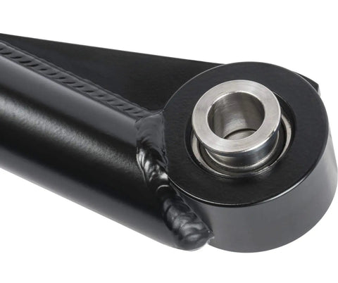Adjustable Track Bar For Ram 2500 4x4 And Ram 3500 4x4 2013 And Newer Beefed Up Front Axle Centering Up To 3 Inches Tightens Steering Feel Improves Alignment And Extends Service Life. black steel front track bar with bushing close-up