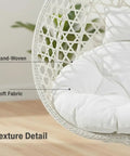 Close-up of Hanging Egg Chair With Stand For Patio And Balcony, Indoor Outdoor Swing Chair With Comfy Cushioned Seat, White Wicker