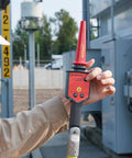 Field tech using High Voltage Detector Kit For Field Techs 30 V To 122 kV AC Intrinsically Safe Pro Grade MSHA Certified, Amprobe TIC 300 PRO.