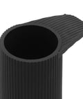 Close-up of black rubber grip from 8 Pack Keyboard Stand Feet Replacement Caps For Digital Pianos And Keyboards Shock Absorbing Non Marking Leg Protectors For Home Studio Easy Install And Secure No Slip.