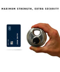 Hand holding Beefy Heavy Duty Diskus Storage Padlock 70mm Wide For Outdoor and Commercial Use, size comparison with credit card