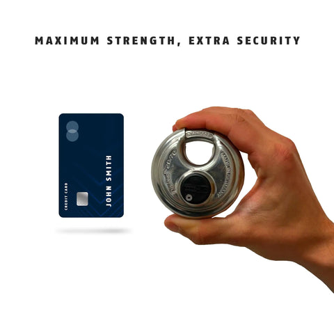 Hand holding Beefy Heavy Duty Diskus Storage Padlock 70mm Wide For Outdoor and Commercial Use, size comparison with credit card