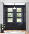 Everly Single Light Schoolhouse Pendant With Clear Glass Shade in a Chill Chrome Finish, modern ceiling light above double doors