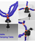 Third Hand Soldering Table Clamp with 3X Magnifier and Five to Six Arms Flexible Gooseneck Helping Hands clamped on table edge