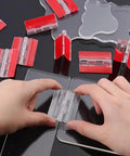 Hands using Clear Acrylic Self Adhesive Hinge Set, 4 Pack, 65x40mm Transparent Folding Hinges on black surface