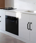 Kitchen with sleek black handles; Dope Black Barn Door Handle Set For Sliding Doors And More, Sleek Rustic Steel Hardware In A 2 Pack