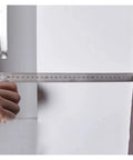 Digital Caliper, Aluminum Alloy Square Ruler 90 Degree Measuring Tool Gauge measuring edge against a wall
