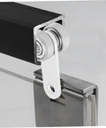 Close-up of Heavy Duty Iron Dual Bearing Caster Wheels For Sliding Gates and Barn Doors, showcasing dual bearings and smooth gliding action.