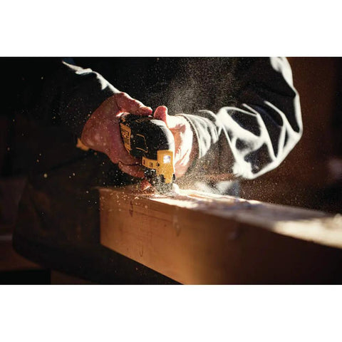 Atomic 20V Max Cordless Oscillating Tool Bare Tool With Brushless Motor Dual Grip Variable Speed Trigger in use on wood