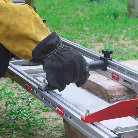 Worker using Aluminum Profile Upgrade For Chainsaw Mill 12 Inch Splice Extension To 48 Inch Boosts Cutting Size To 48 Inches on wood