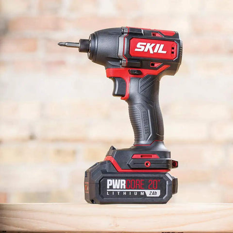 Close-up of 1/4 inch hex impact driver from 2-Tool Cordless Drill Driver And 1 Quarter Inch Hex Impact Driver Kit with Brushless 20V Power PWRCore 20 2.0Ah Battery PWR Jump Charger Ready For Tough Jobs And DIY Projects.