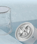 Portable Underwear Washer Mini Compact Laundry Device Built In Rechargeable Battery showing the washing container and spinning drum.