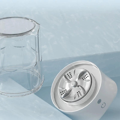 Portable Underwear Washer Mini Compact Laundry Device Built In Rechargeable Battery showing the washing container and spinning drum.