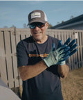 Person wearing Filet Gripper Glove With Non Slip Grip, Cut Resistant, Quick Dry, Breathable Second Skin Fit Fishing Glove In Neon outdoors.
