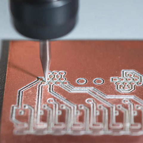 Close-up of drilling on Double Sided Copper Clad FR4 PCB Board 70x50mm 1mm Thick Eight Pack for DIY Prototyping and Electronics Projects