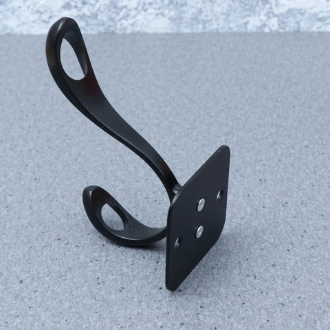 Vintage Matte Black Wall Hooks Set Of Five For Hanging Heavy Coats Umbrellas And Handbags Boasts Dope Industrial Vibes And Rock Solid Screw Mount Hardware, individual matte black hook on a gray surface.