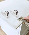 No Sweat Silent TPR Drawer Casters 4 Piece Heavy Duty Fixed Rolling Wheels For Office Cart And Cabinet Smooth Ride Replacement Hardware Flat Plate Mount Brackets with metal plate mounts on a cabinet.