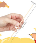 One Hundred Pack Premium Natural Wood Dowel Rods One Eighth By Six Inches Ultra Smooth Round Craft Sticks held in hand for scale.