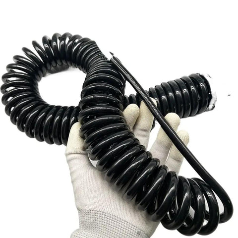 Heavy Duty Three Core Telescopic Extension Cord Self Retracting Power Cable with protective jacket in hand.