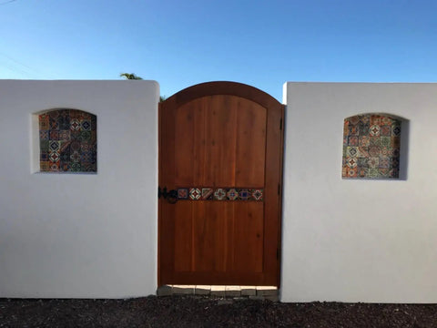 Mexican Tile Mix 100 Tiles 4x4 Ceramic Squares In Totally Mixed Colors on white wall with wooden gate Spanish Colonial Style