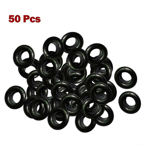 Badass Plastic Eyelets Hand Press Kit Adjustable Resin Grommets 50 pack black grommets shown in bulk for tent and tarp reinforcement.