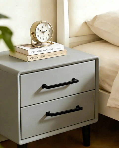 Matte Black Cabinet Pulls Pack Of 20, 5 Inch Length on gray dresser with clock and books
