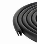 Black U Channel Edge Trim Seal EPDM 33/64 Inch High By 11/32 Inch Wide shown coiled in a roll
