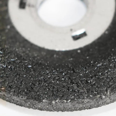 Close-up of a 2 Inch Grinding Wheel from the 25 Pack Polishing Discs for Mini Angle Grinder, designed for metal and wood.