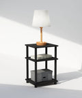 3 Tier Open Storage Nightstand With Turn N Tube Poles, Sleek Americano Black Bedside Table with lamp, books, and box