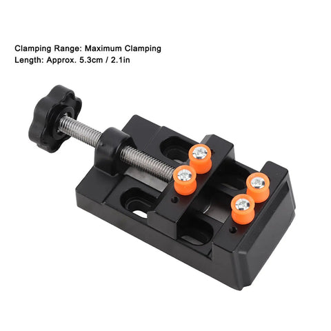 Portable Bench Vise Base With Quick Release Clamp Table For Drill Press handling round and weird shaped pieces in durable black aluminum.