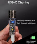 Hand holding Pocket EDC USB C Rechargeable Flashlight With Magnetic Clip, showing charging status with blue and green lights.