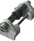 Close-up of Dead On Angle Honing Guide For Wood Chisels And Plane Irons, Adjustable Sharpening Jig with solid grip.