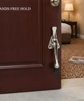 Foot Operated Door Stop With Zinc Alloy Floor Holder For Hands Free Entryway Access on interior wooden door in room