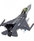 F16 Fighting Falcon Fighter Jet Building Kit With Over 500 Pieces, side view showing cockpit and missiles. Great for collectors.