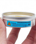 Tin of No Clean 35g Paste Flux for Soldering BGA PGA and SMD PCBs with clear warnings and usage instructions visible on label