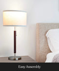Carter LED Bedside Lamp With Soft Ambient Glow For Bedroom And Office, stainless steel base, walnut finish, on nightstand