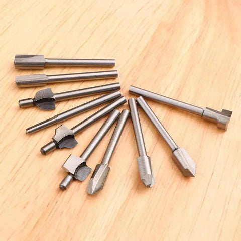 Ten Piece HSS Router Bit Set With One Eighth Inch Shank For DIY Woodworking displayed on wooden surface