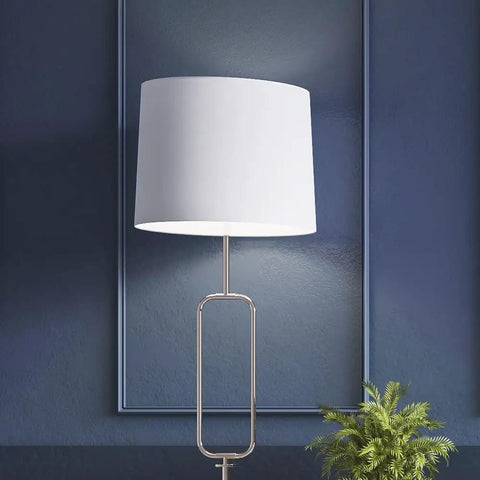 12 Pack 9W LED A19 Bulbs That Replace 60W, 800 Lumens, 5000K Daylight Cool White in a modern lamp.
