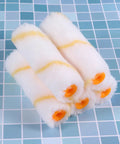 Five foam roller covers featuring yellow stripes for the Twenty Piece Mini Paint Roller Kit Featuring Slick High Density Foam Covers Crafted For Tight Spots And Smooth Wall Jobs The Portable Setup Makes Home Touchups A Total Cinch And Guarantees Straight Up Slick Results Every Single Time.