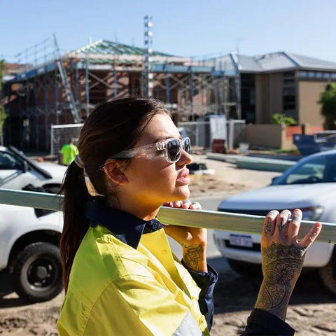 Top Shelf Clear Frame Polarized Safety Glasses Osha Approved Ansi Z87 Plus Certified worn by worker on construction site