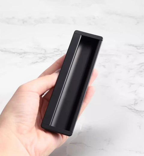 Hand holding Hidden Black Drawer Pulls With Embedded Design For Sleek Cabinets, modern black sliding cabinet handle, 4.72 inch length