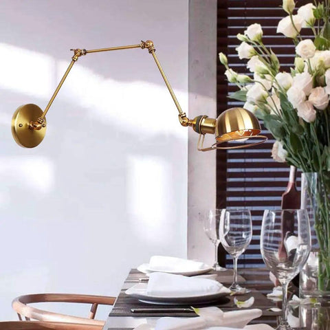 Top Shelf Heavy Duty Metal Swing Arm Wall Sconce Featuring Smooth Adjustable E27 Bulb Socket For Modern Bedrooms And Hallways with brass finish.