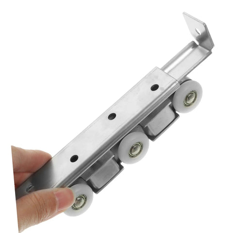Super Smooth Sliding Barn Door Track Roller System With Heavy Duty Wheels For Kitchen Pantry Bathroom Room Divider Easy Install Rock Solid Iron Mount close-up of smooth roller system.