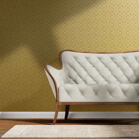 Glow Up Your Space With Top Shelf Abstract Scalloped Gold Metallic Wallpaper For Modern Interiors with elegant cream sofa.