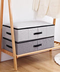 Built Tough Foldable Storage Tubs With Slick Glide Bottom For Easy Tucking Under Beds And Closets shown in gray and black fabric.