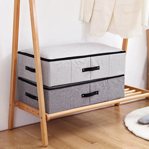 Built Tough Foldable Storage Tubs With Slick Glide Bottom For Easy Tucking Under Beds And Closets shown in gray and black fabric.